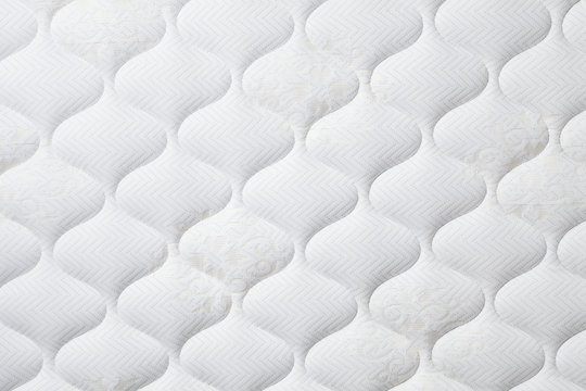 synthetic fibers on a mattress surface