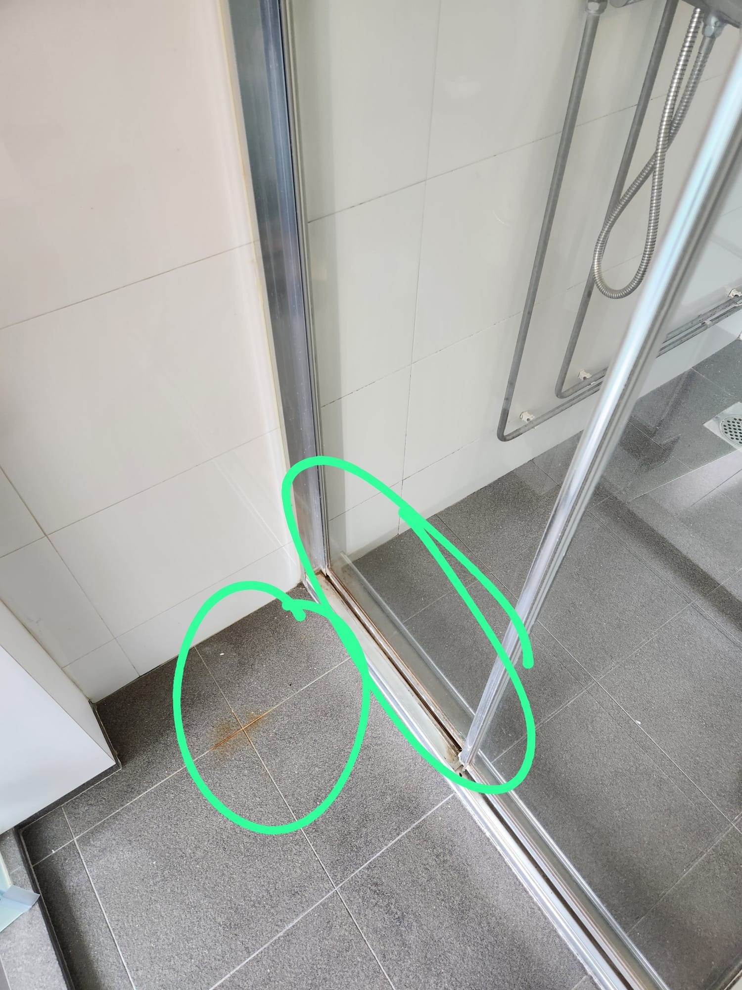 Stains on the floor caused by previous cleaning companies.